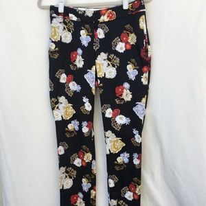 H & M black pants with brightly colored flowers!